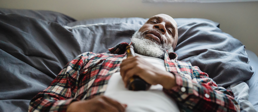 Man sleeping with a beer bottle