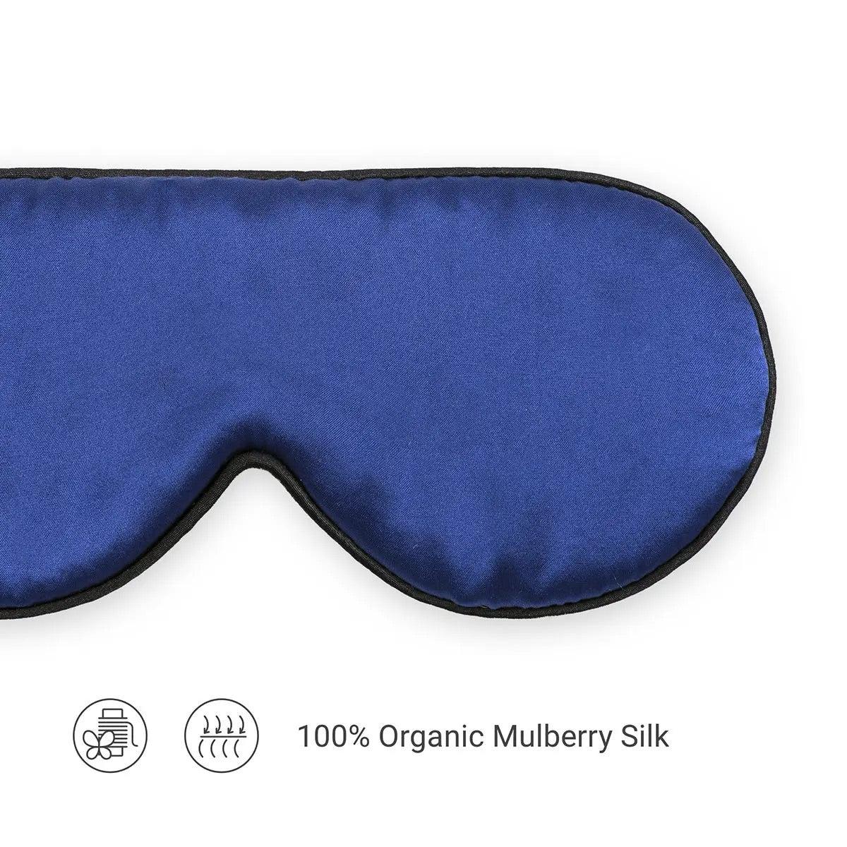 A blue silk sleep eye mask made from organic mulberry silk