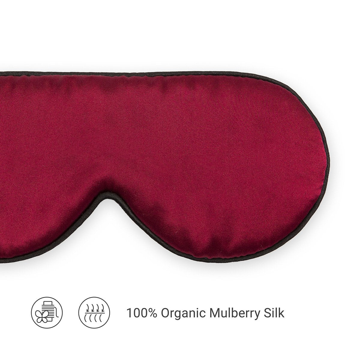 A red silk sleep eye mask made from organic mulberry silk