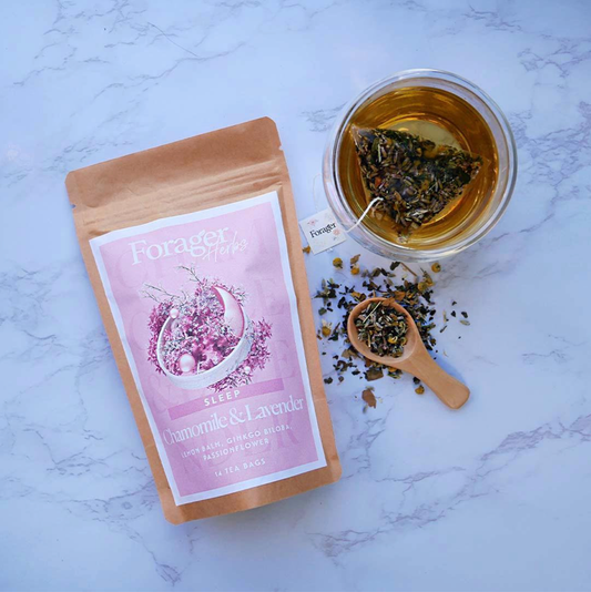 Packet of herbal sleep tea with a cup of tea
