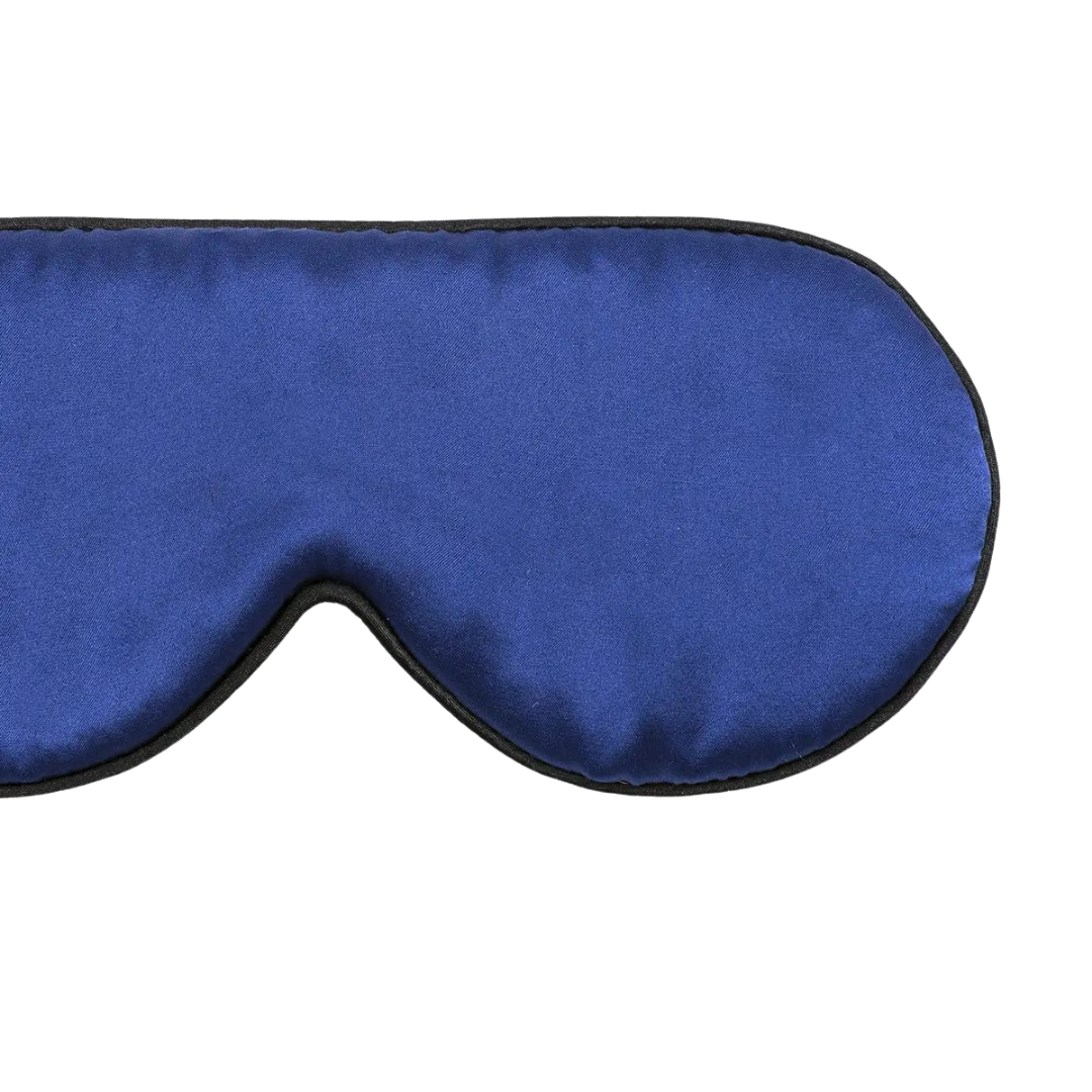 A blue silk sleep eye mask made from organic mulberry silk