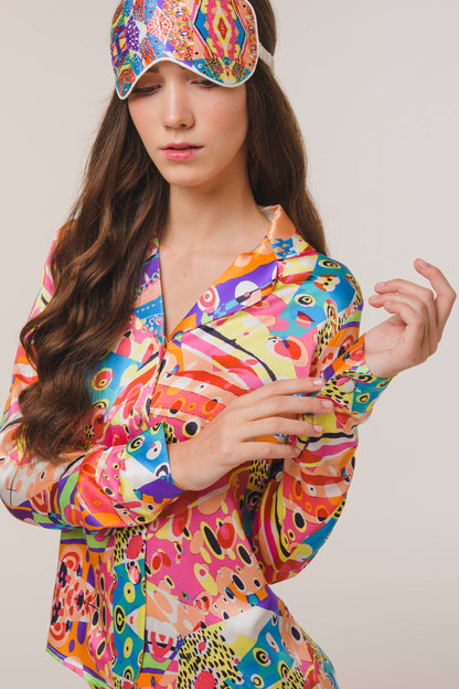 Model wearing Harlequin Print Mulberry Silk Sleep Eye Mask