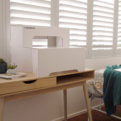 Mojostand standing desk converter on a desk